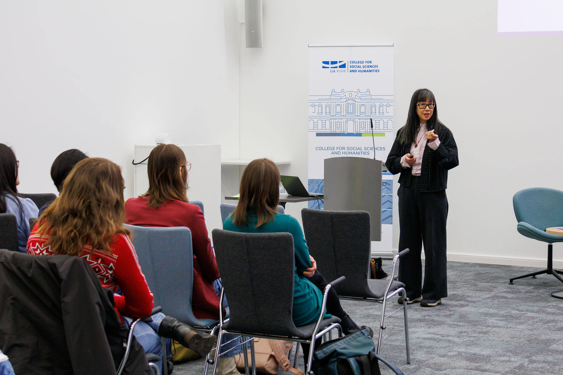 photo from the workshop 'Ethnic-Racial Socialisation', Linda Juang giving the keynote speech