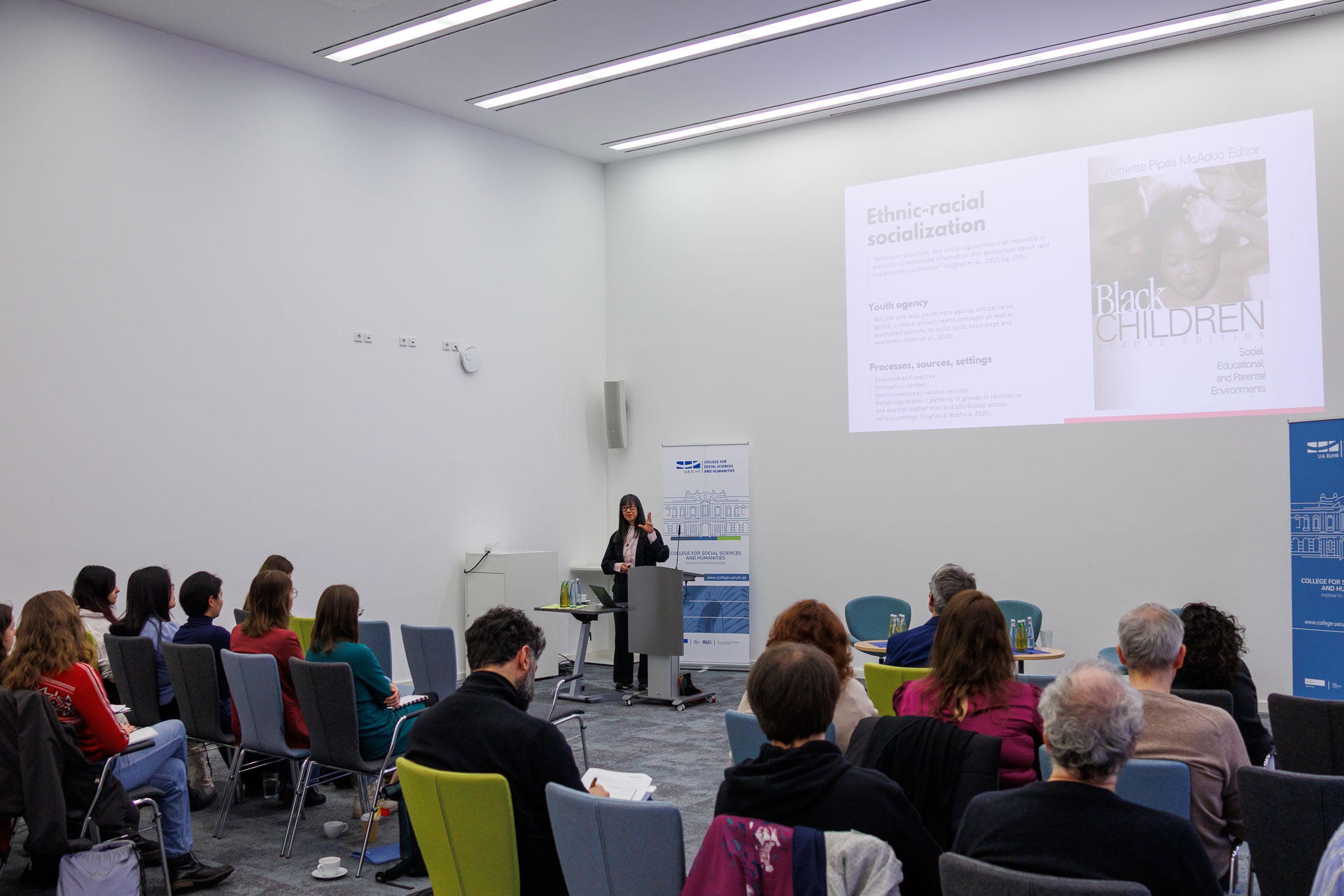 photo from the workshop 'Ethnic-Racial Socialisation', Linda Juang giving the keynote speech